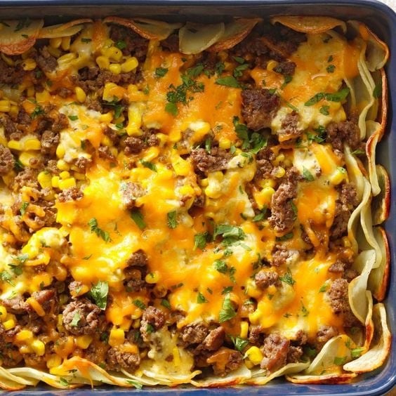 Meat-and-Potato Casserole made with cream of celery soup, frozen corn, potatoes, and onions.