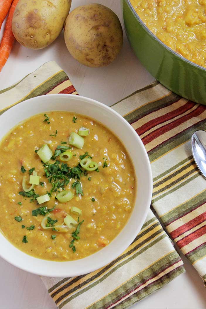 Homemade Indian-Spiced Mulligatawny Soup in a White Bowl