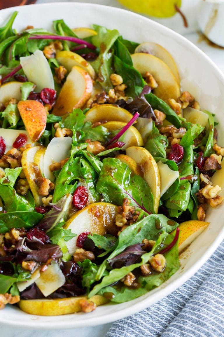 Autumn pear salad with spring greens, sweet pears, candied walnuts, parmesan, and balsamic vinaigrette. 