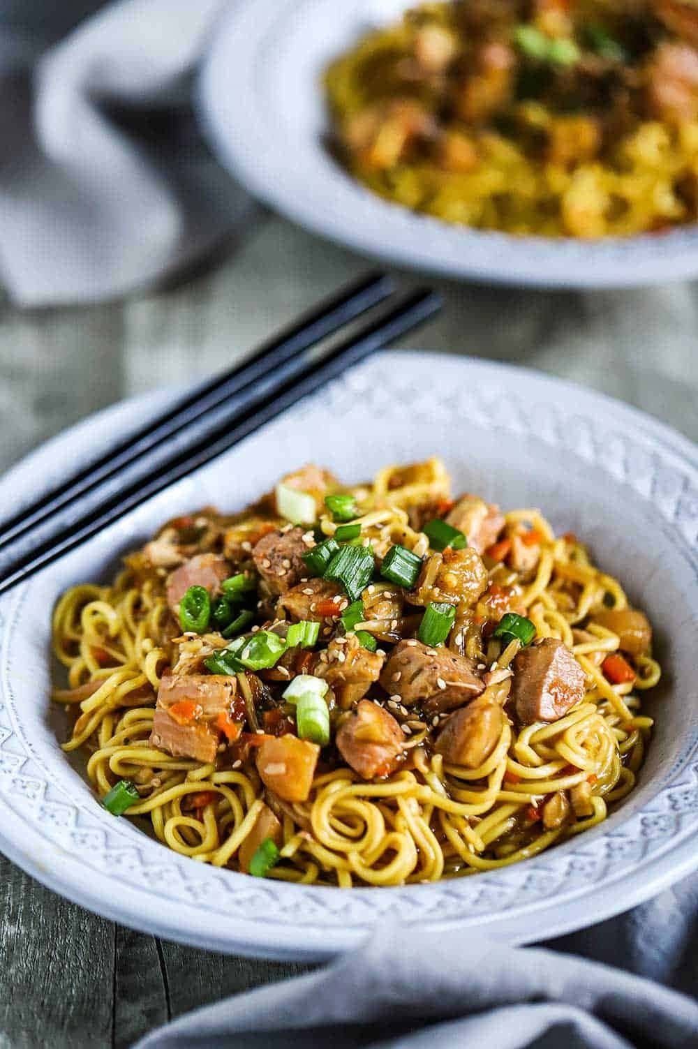 Homemade Slow Cooker Chicken Chow Mein garnished with toasted sesame seeds