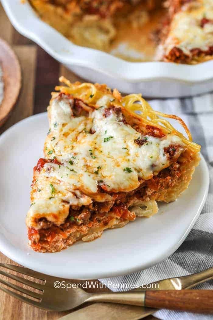 A slice of Spaghetti pie on a plate. 