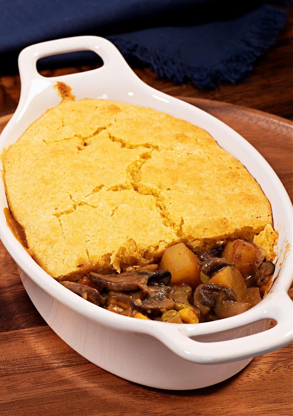 Mushroom pot pie in a white dish. 