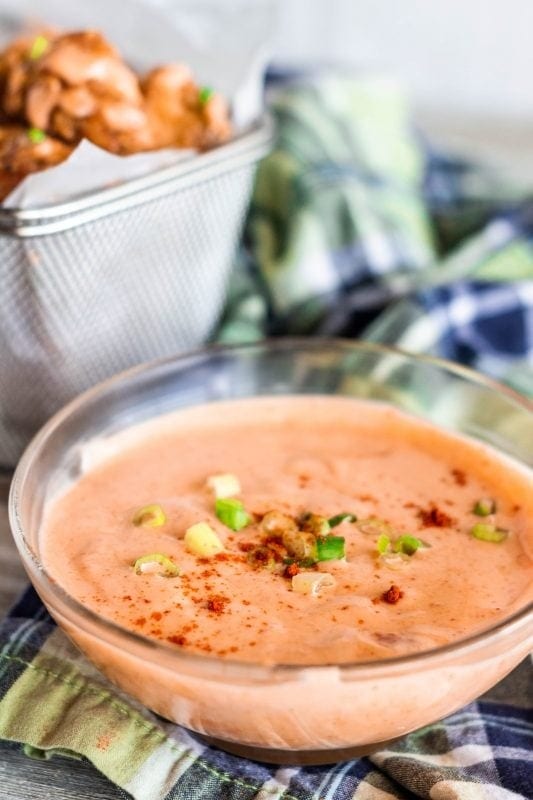 Spicy homemade bang bang sauce with green onions, mayo and paprika