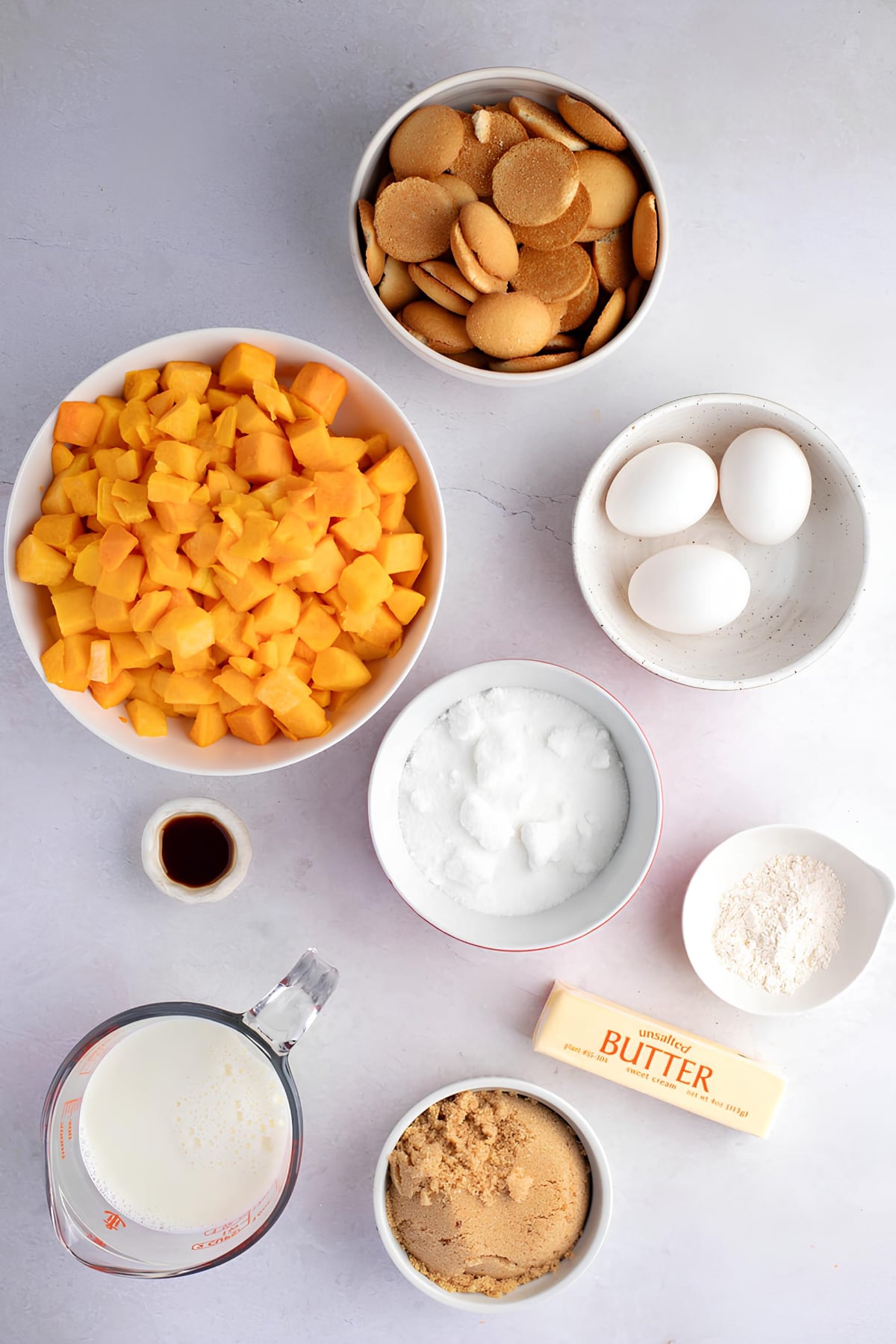 Ingredients for Butternut Squash Casserole Including Eggs. Butter, Milk and Sugar