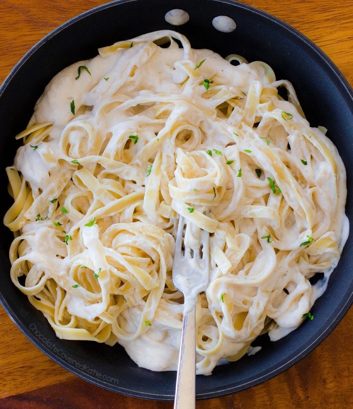 Alfredo pasta with creamy cauliflower sauce on a pan. 