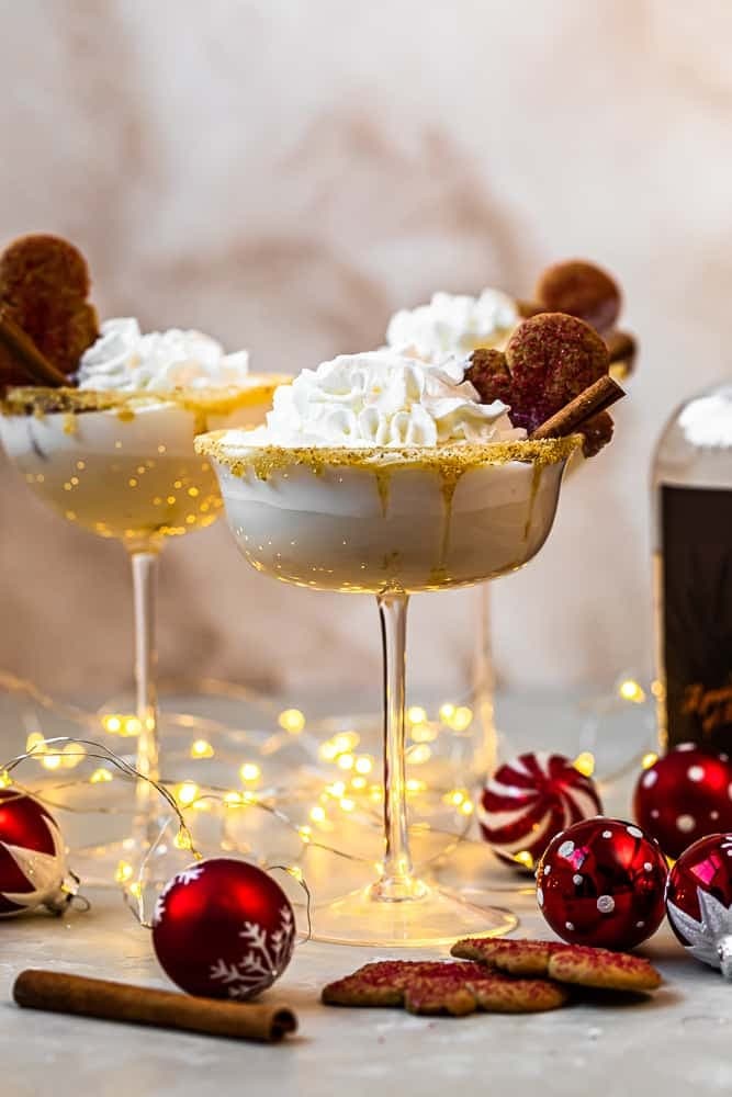 Creamy cocktails served in Martini glasses topped with whipped cream and pumpkin spices.