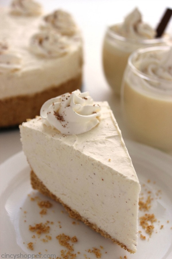 A slice of creamy eggnog cheesecake.