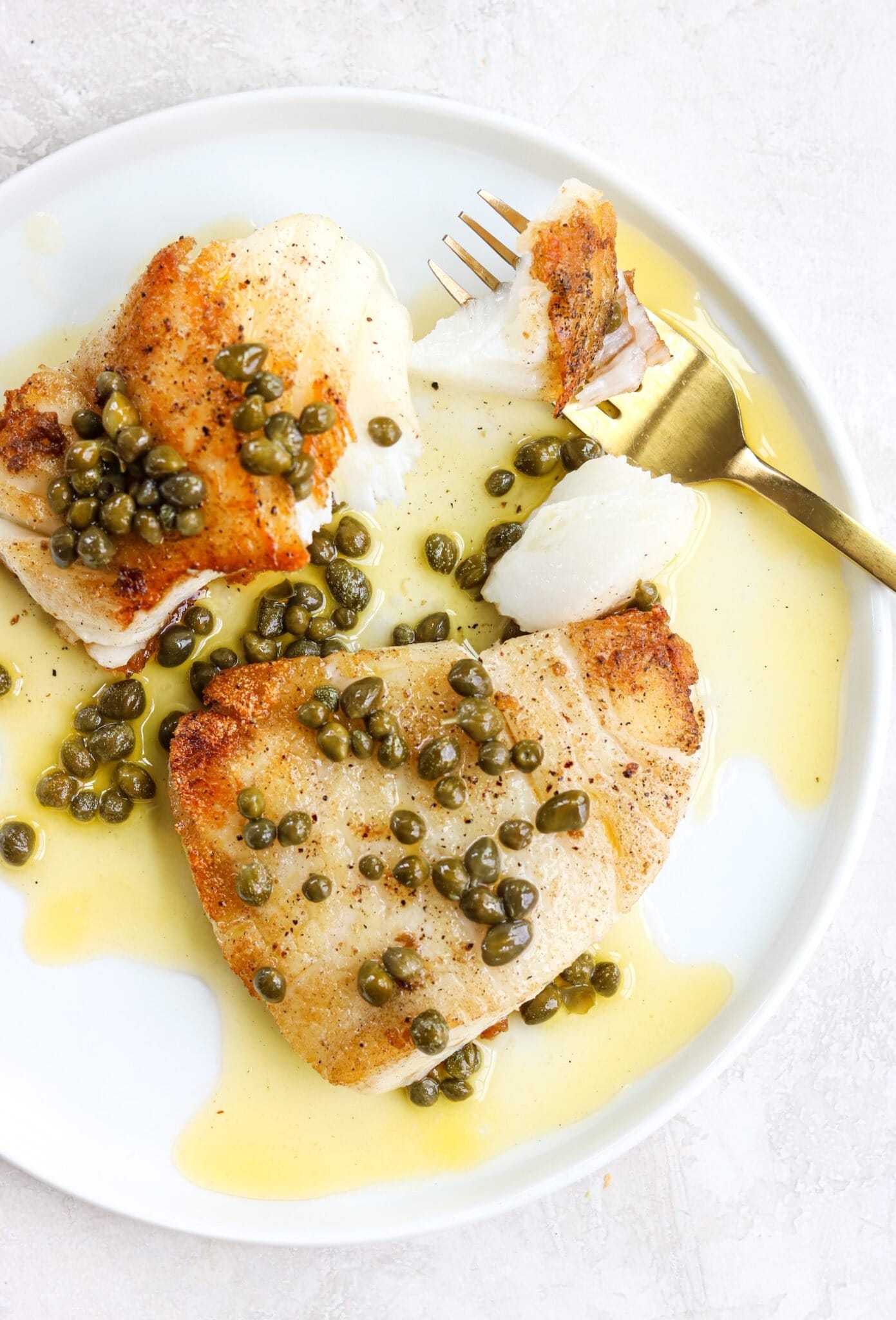 Pan seared sea bass with lemon caper butter sauce. 