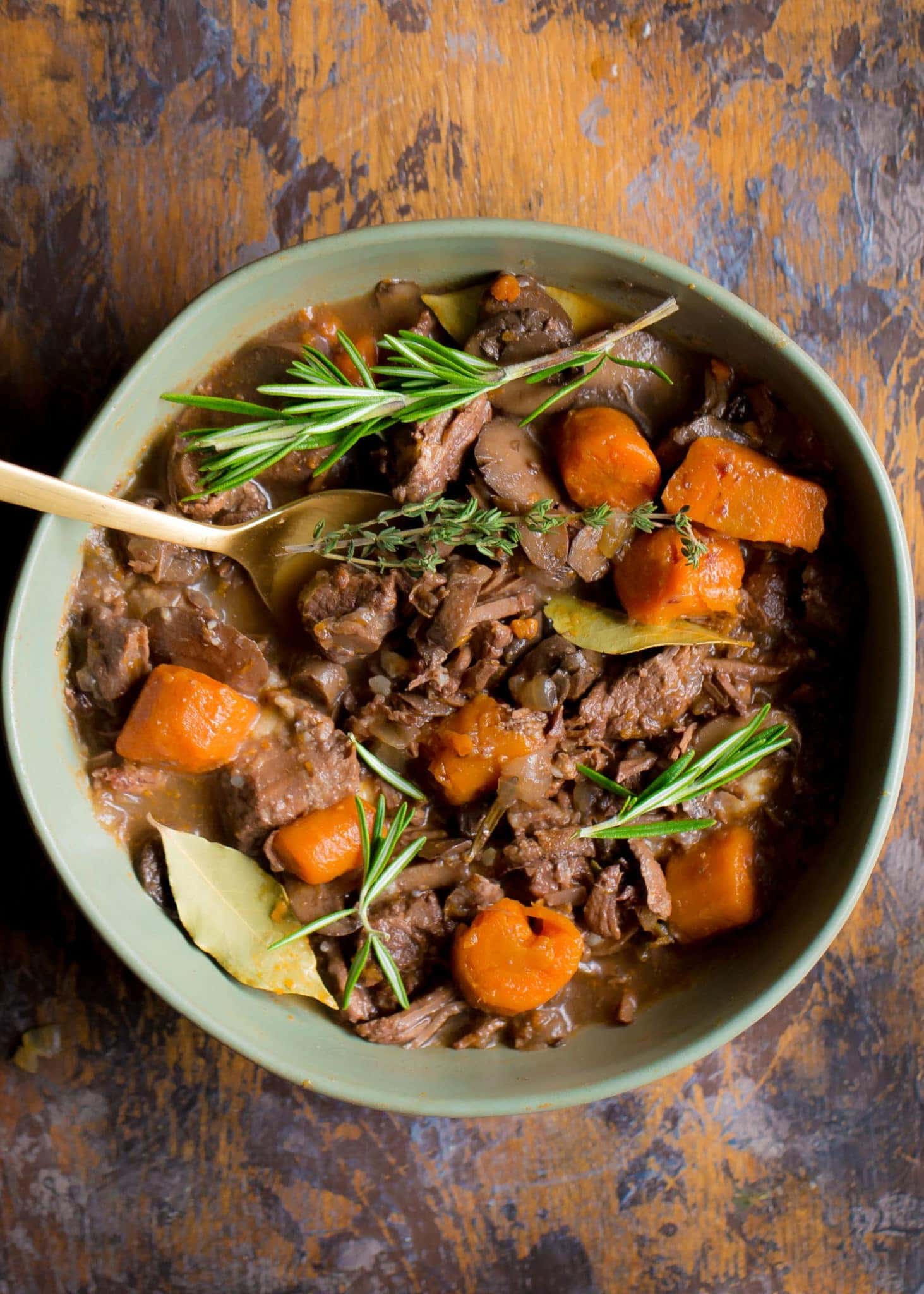 Beef burgundy with chopped veggies and savory sauce served on a bowl. 