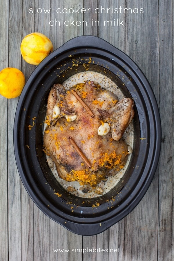 Chicken in a slow cooker with milky sauce, orange zest, cinnamon sticks and seasonings.