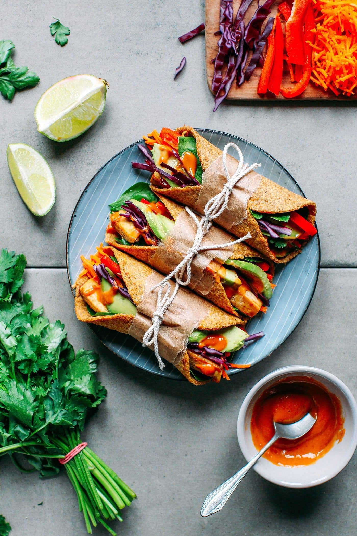 Top view of spicy thai flaxseed wraps with fresh vegetables