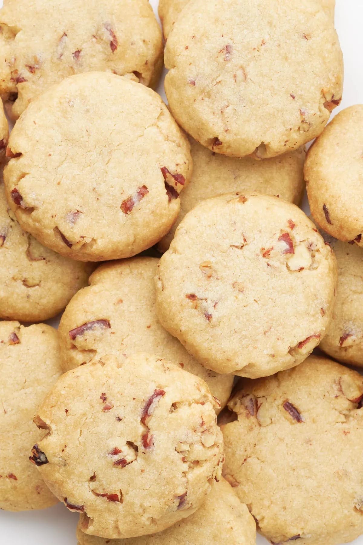 Bunch of shortbread cookies with pecans. 