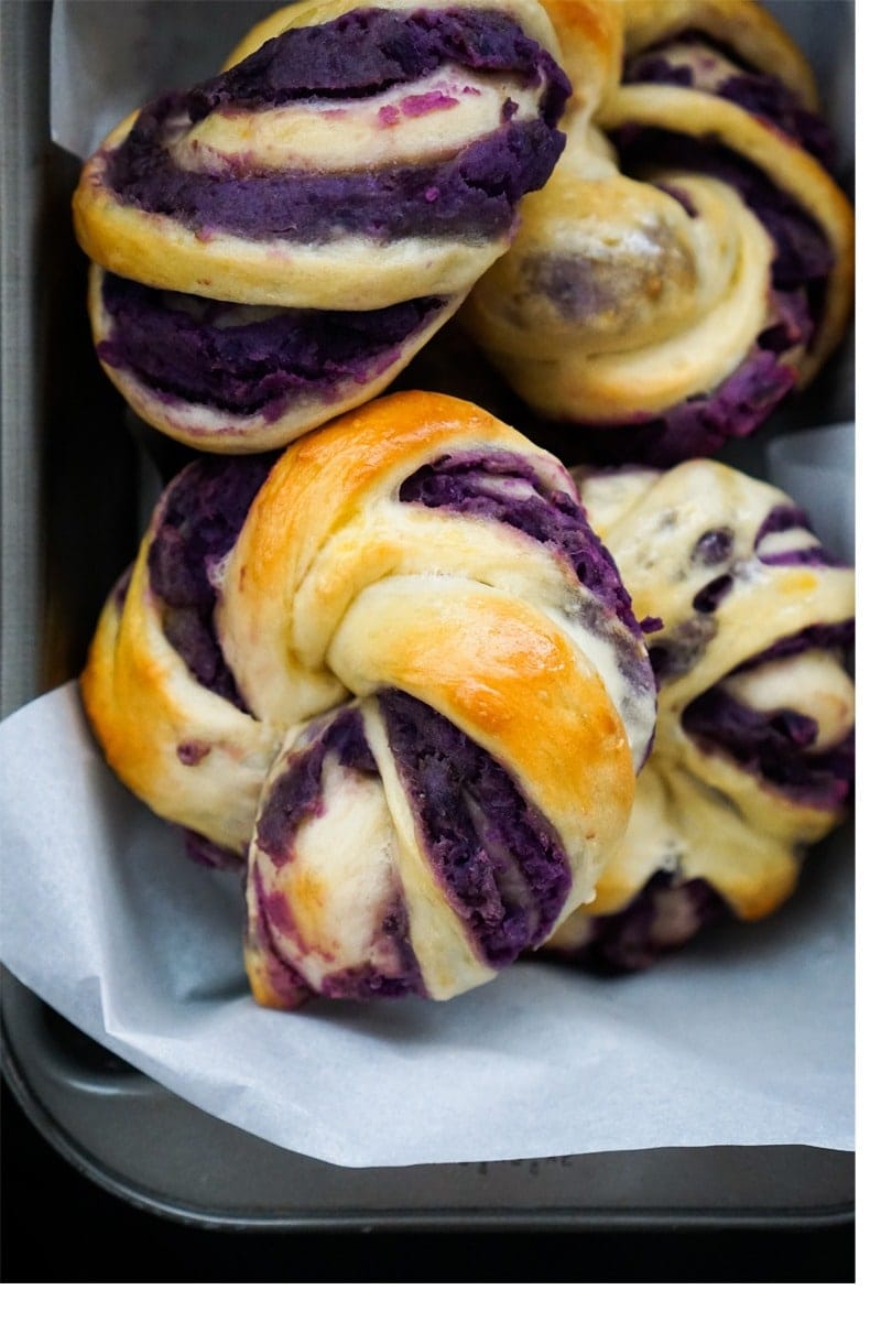 Homemade, striped, soft, and sweet purple potato buns with condensed milk