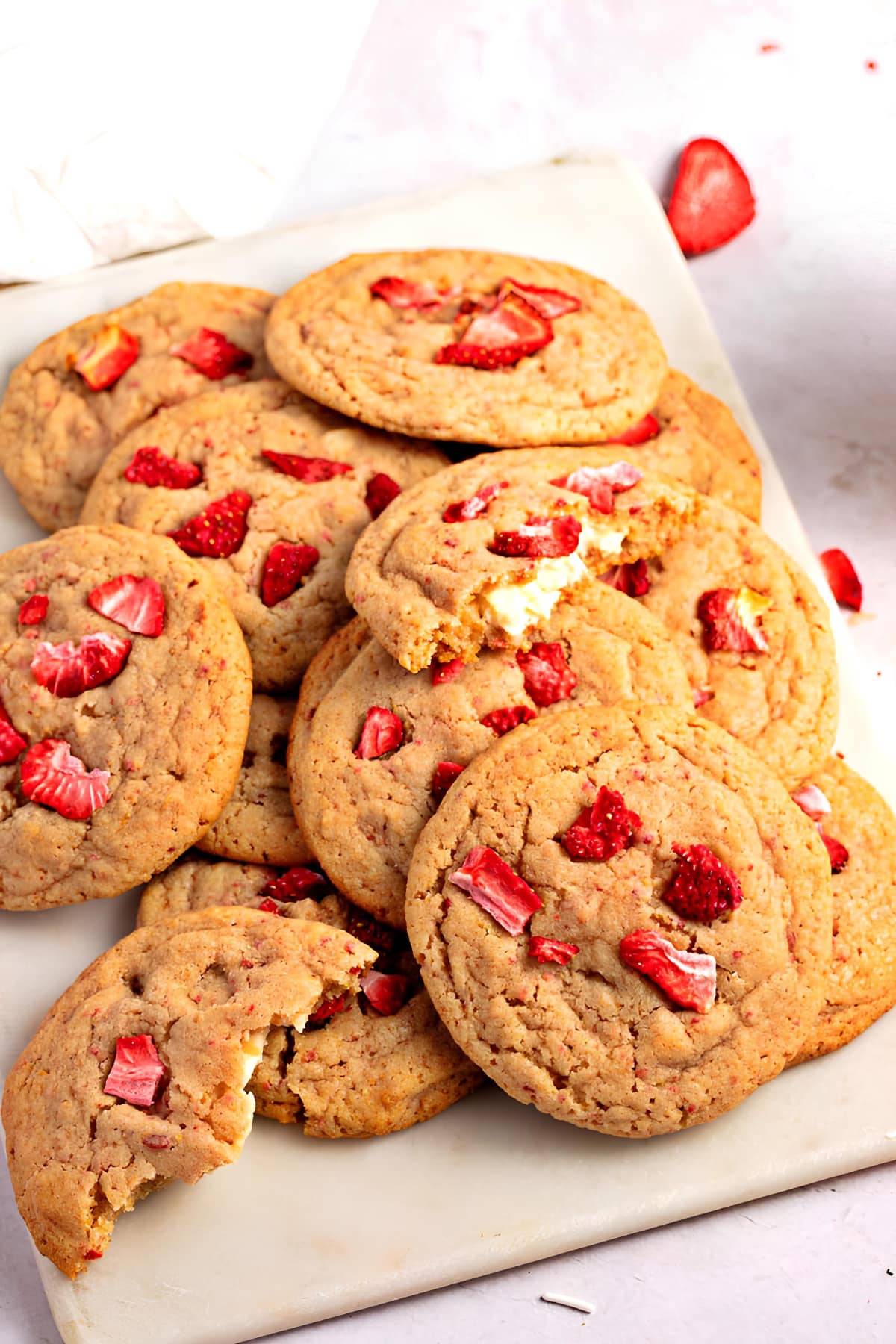 Thin strawberry cookies with cream filling.