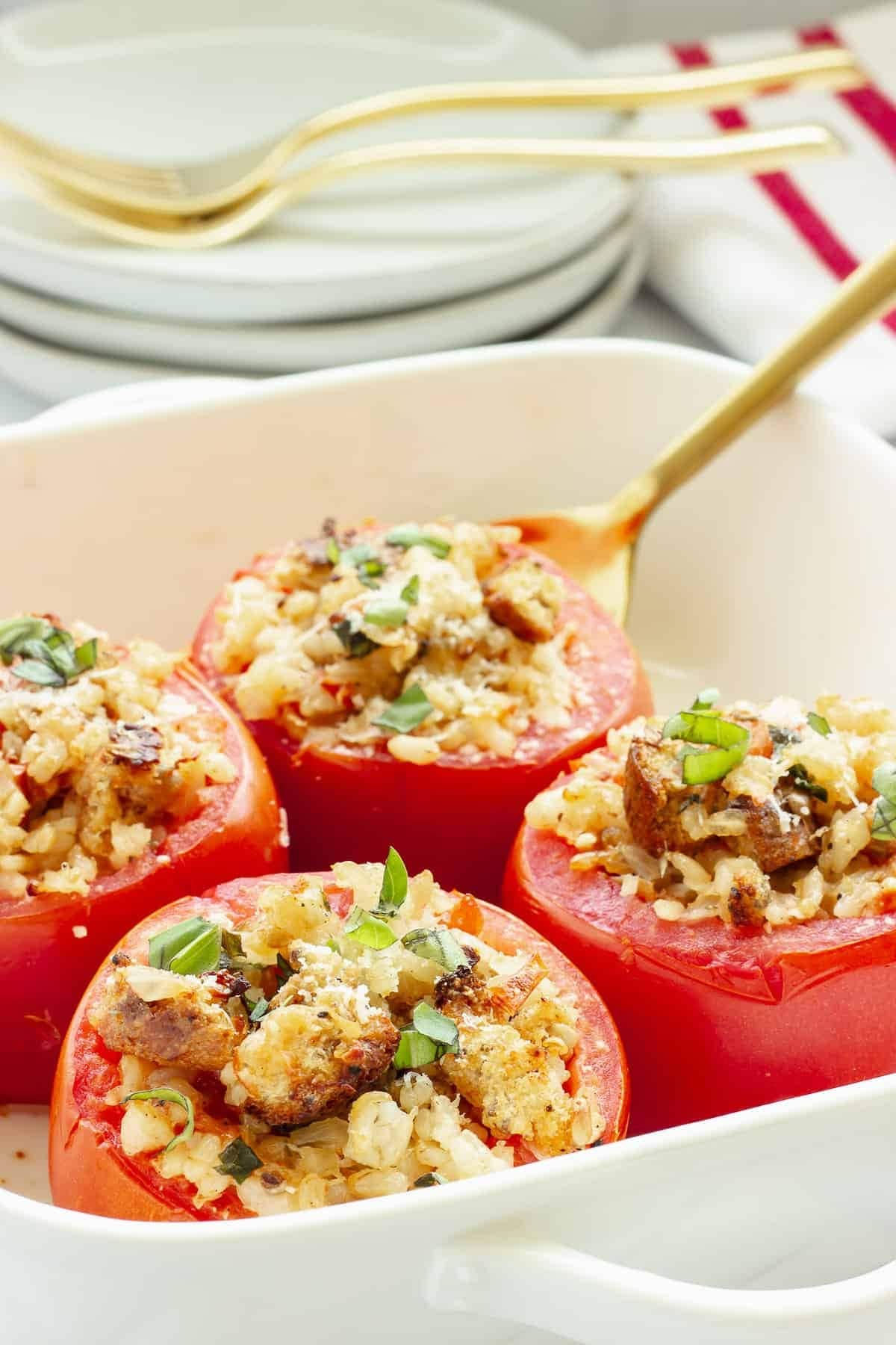 Baked tomatoes stuffed with  rice, herb, and cheese filling.