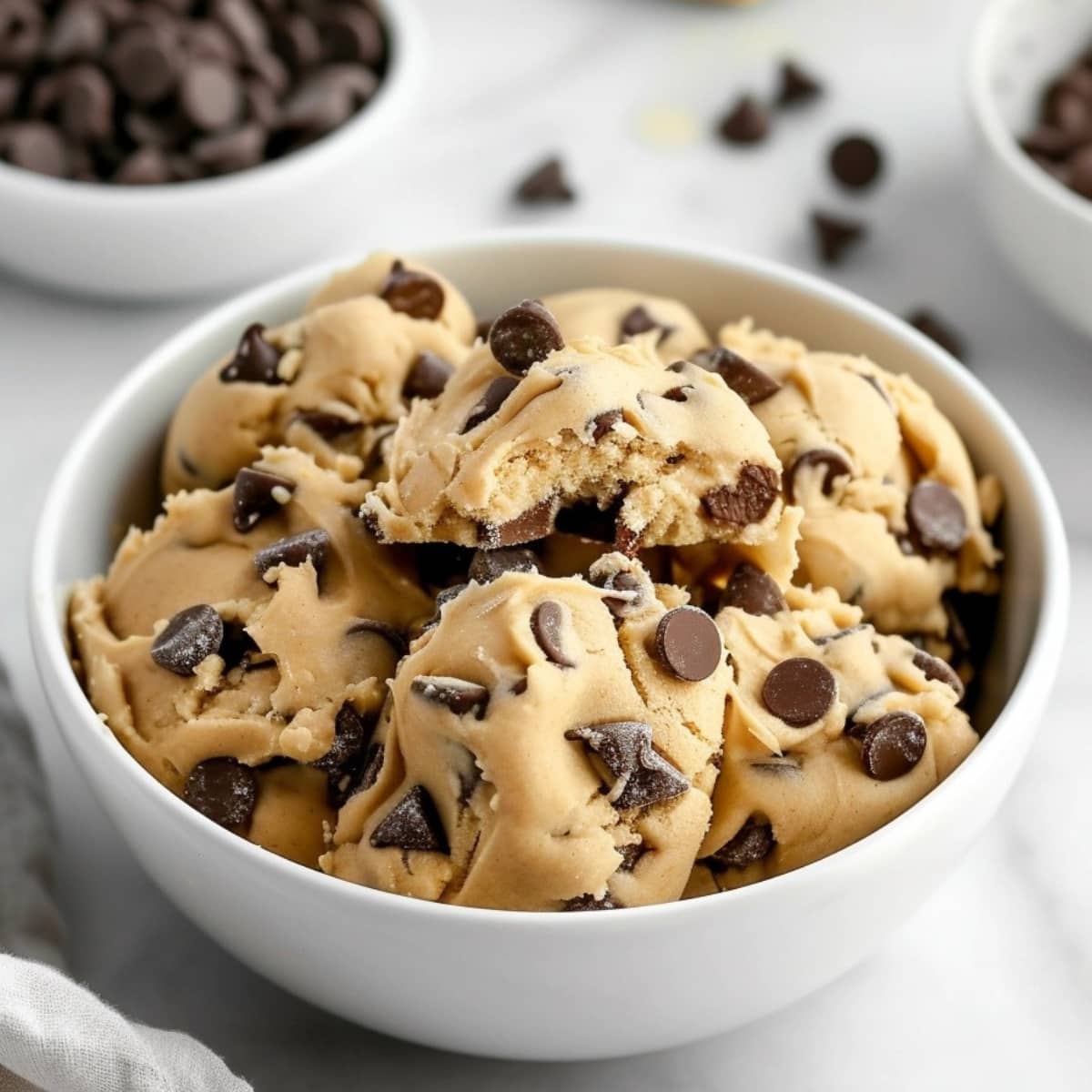 Bowl of edible cookie dough with chocolate chips
