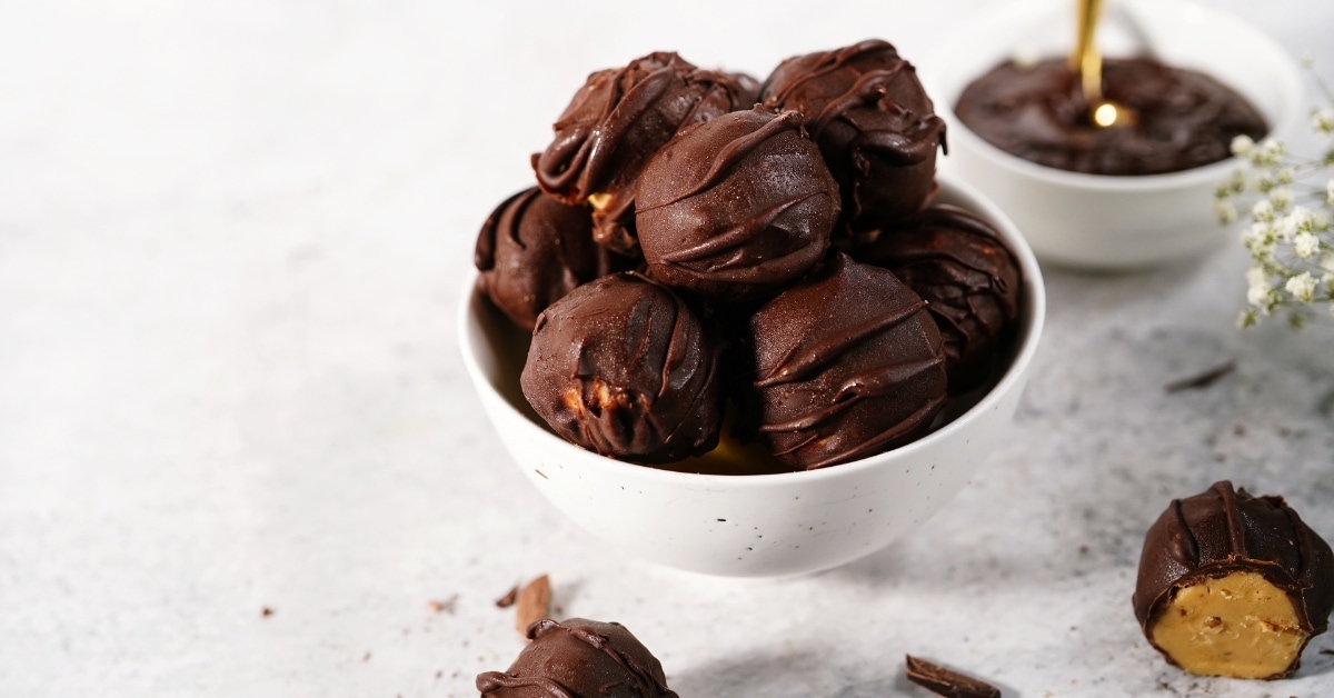 Bowl with chocolate covered peanut balls.