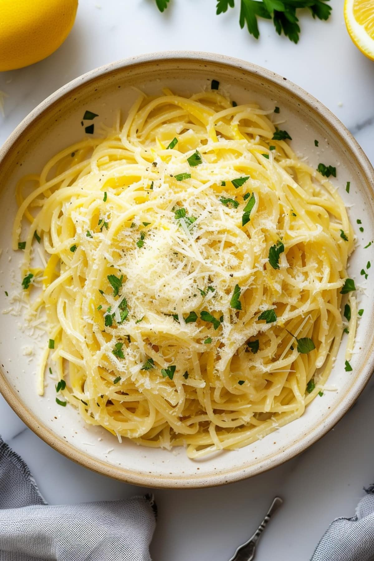 Light and refreshing homemade lemon spaghetti with hersb and parmesan cheese