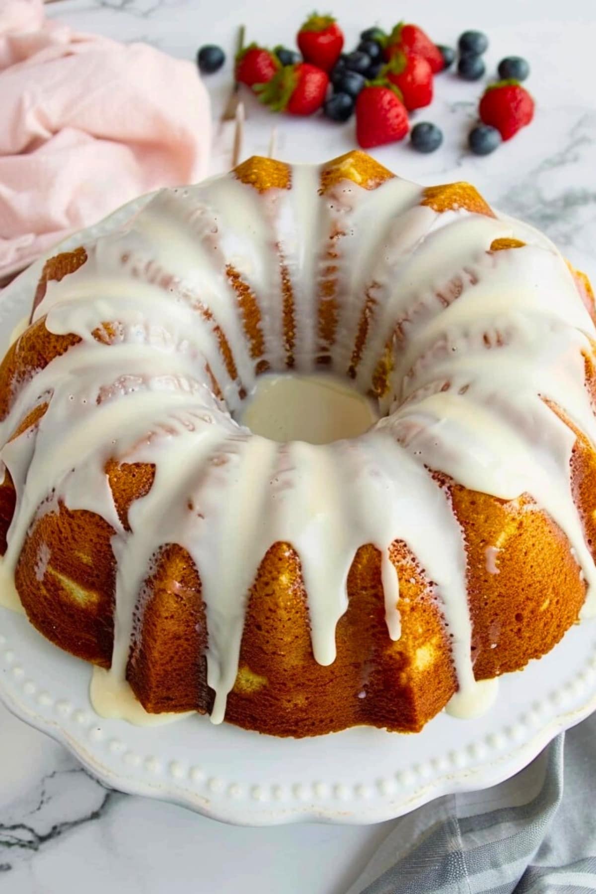 Million Dollar Pound Cake dripping with white glaze.