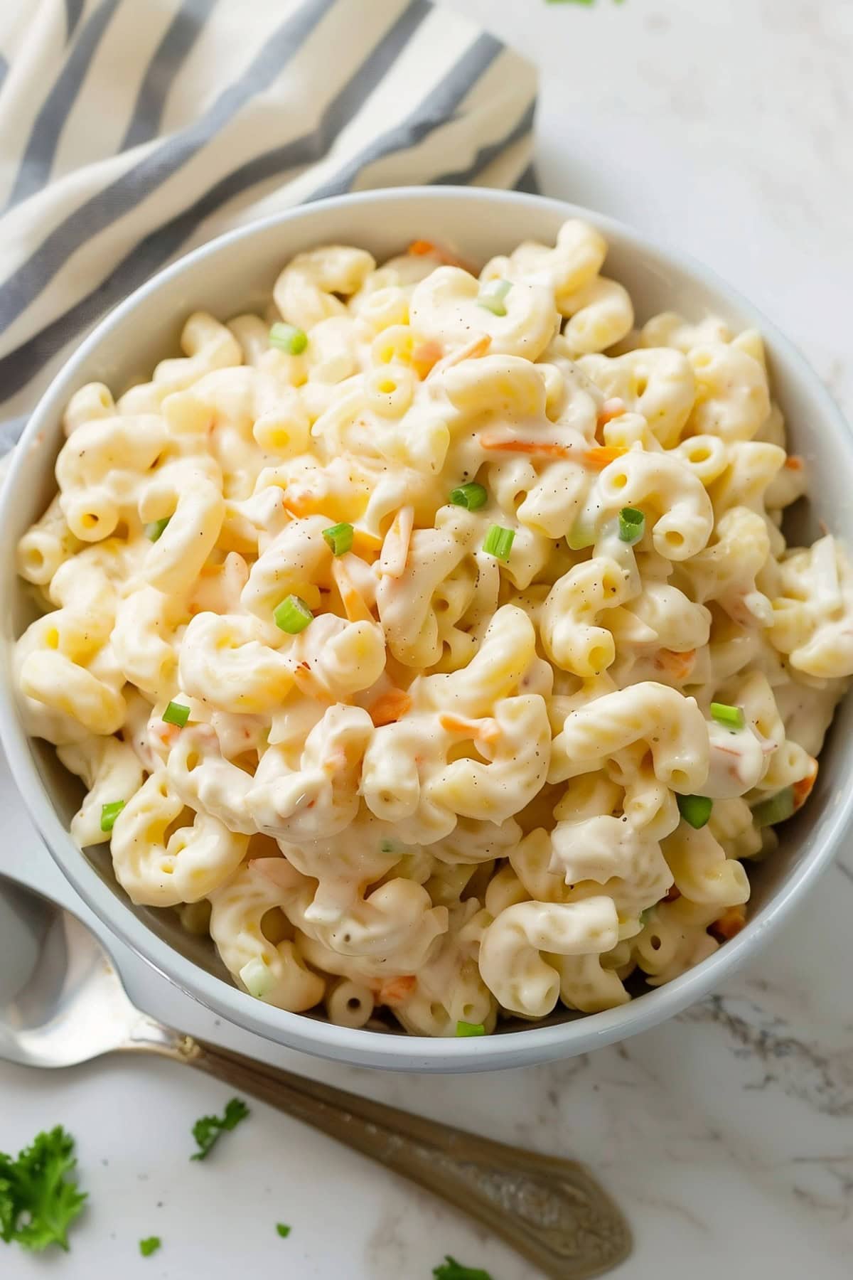 Irresistible Hawaiian-style macaroni salad, featuring tender pasta and a tangy mayonnaise dressing