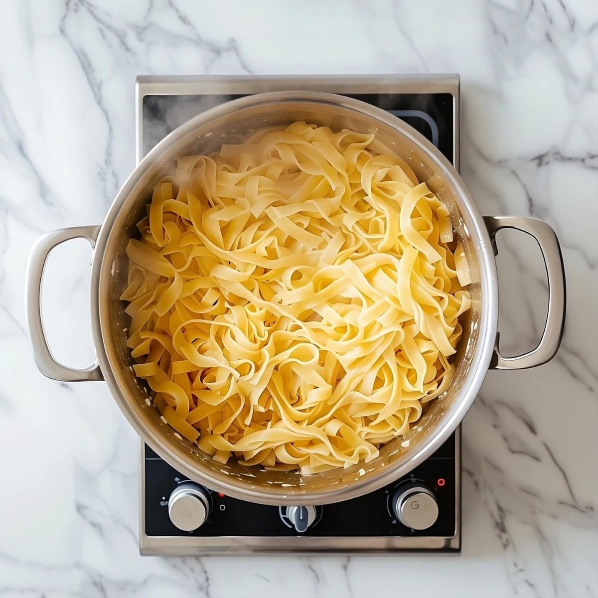 Cooked noodles in a pot.