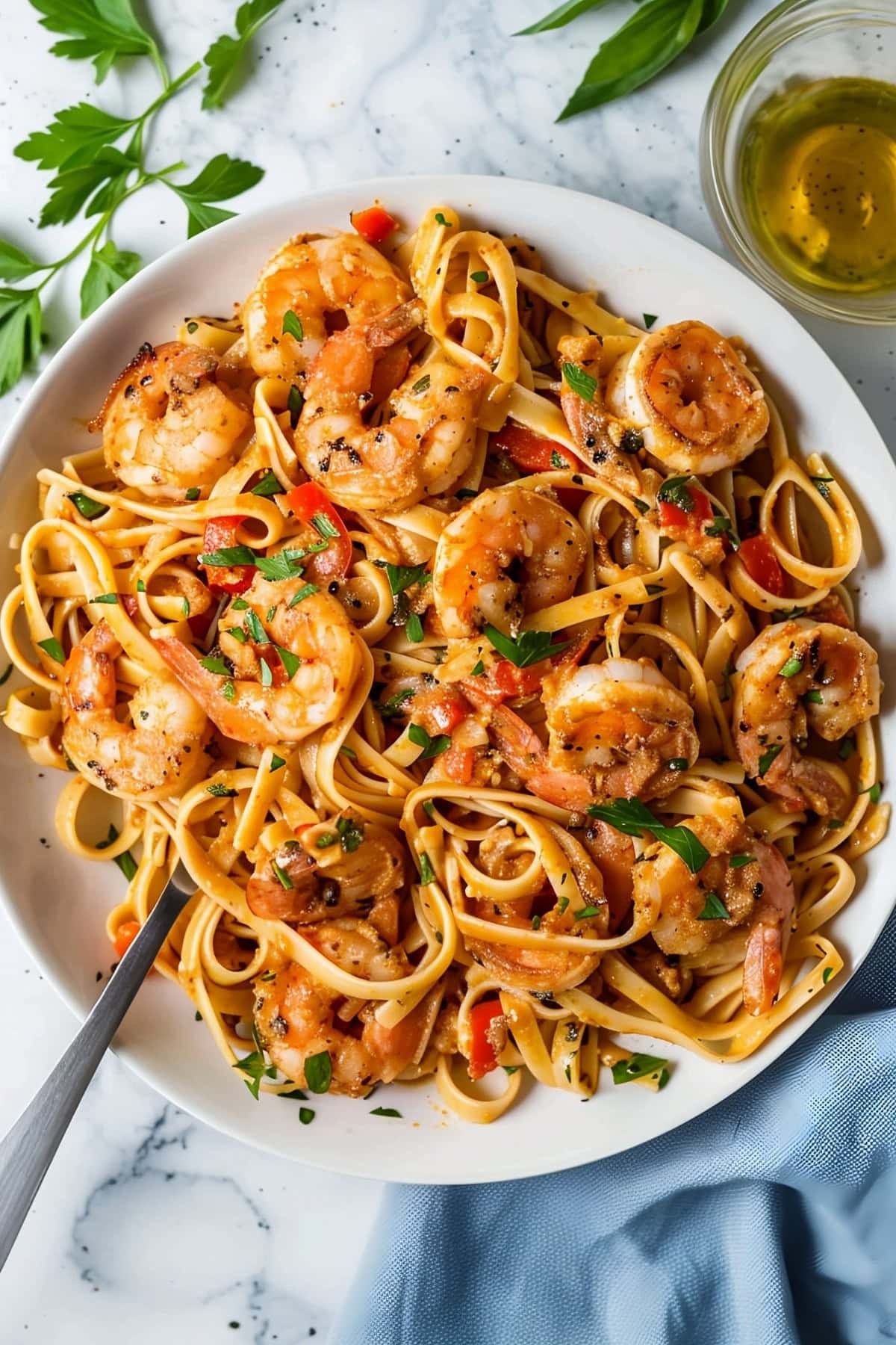 Fettucine pasta with tender shrimp and Cajun seasoning, garnished with parsley