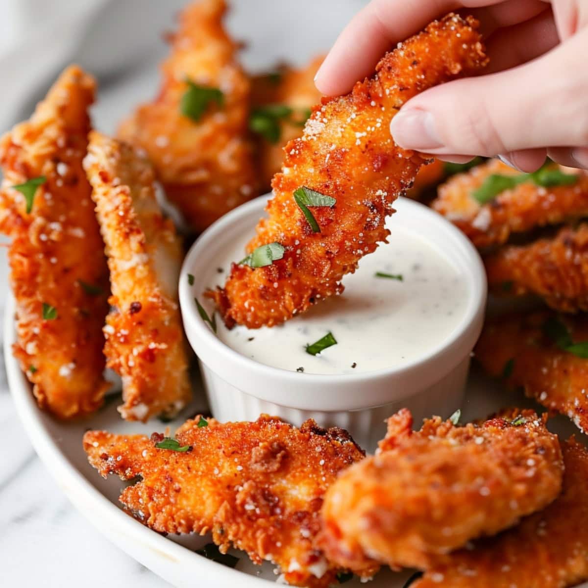 Crushed Dorito coated chicken tenders dipped in ranch dressing.
