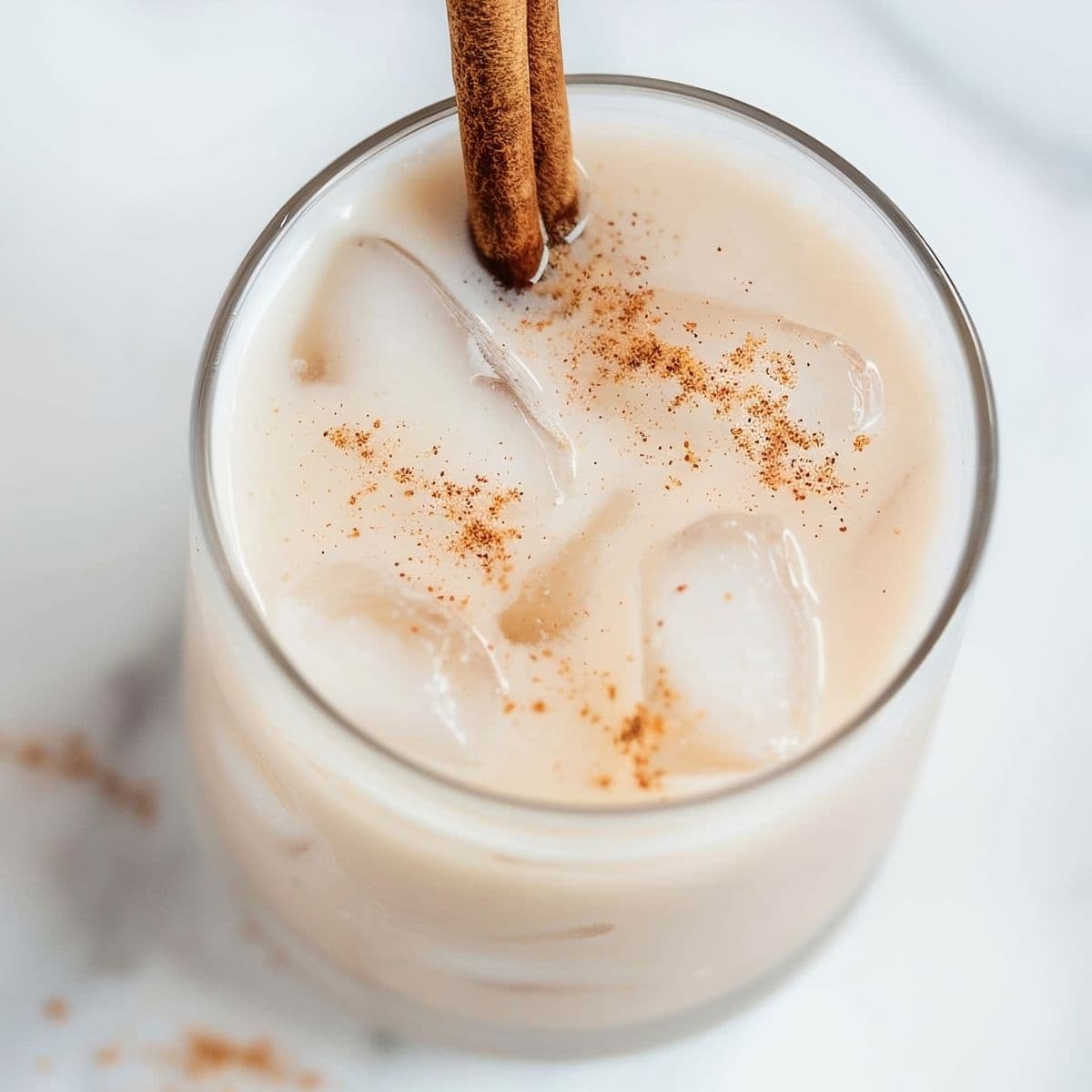 Top View of Mexican Horchata with Cinnamon and a Cinnamon Stick