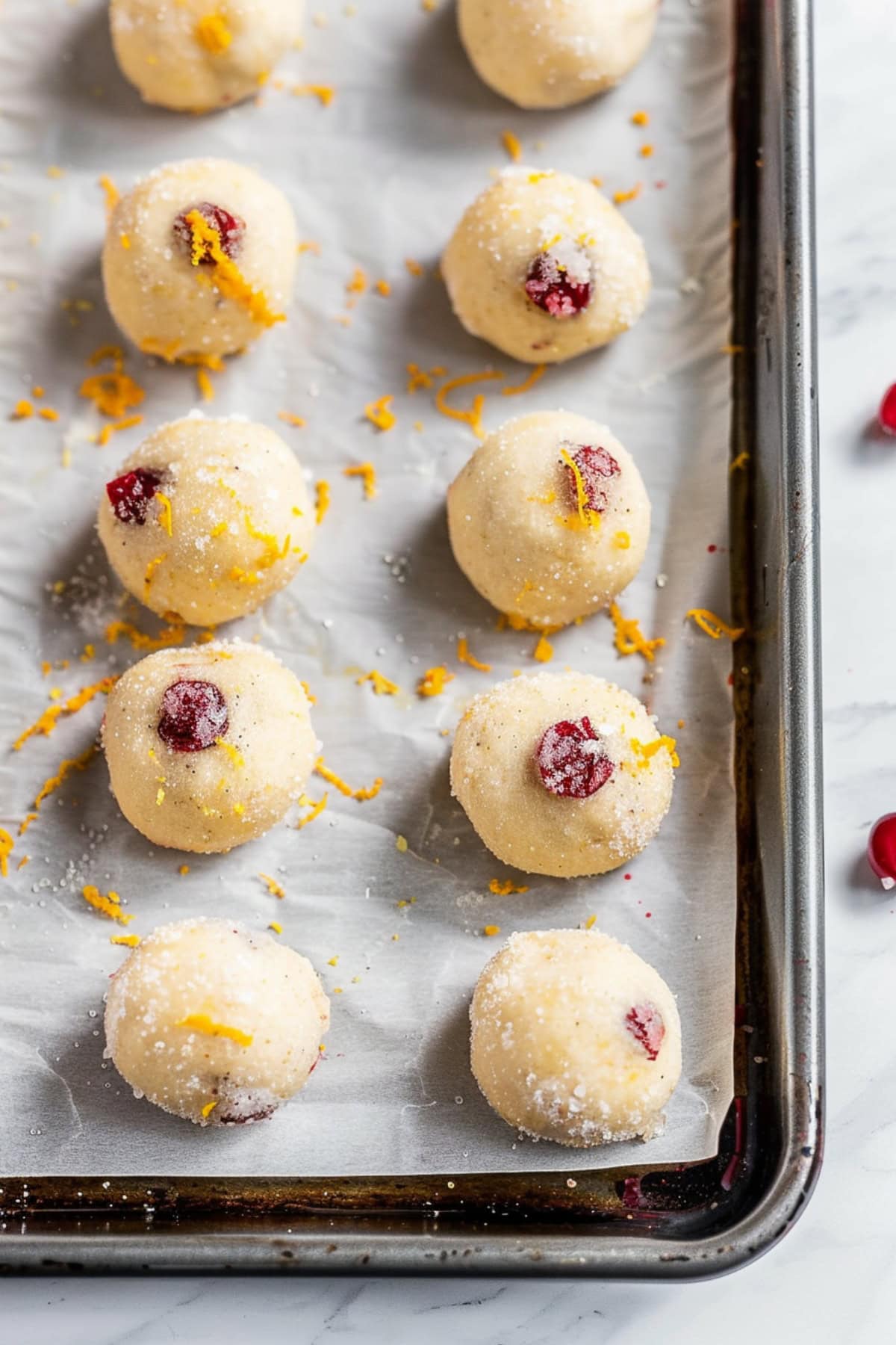 Cookie dough balls with cranberries.