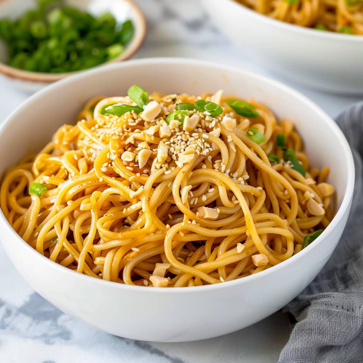 Quick and easy sesame noodles, featuring a sesame sauce dressing.