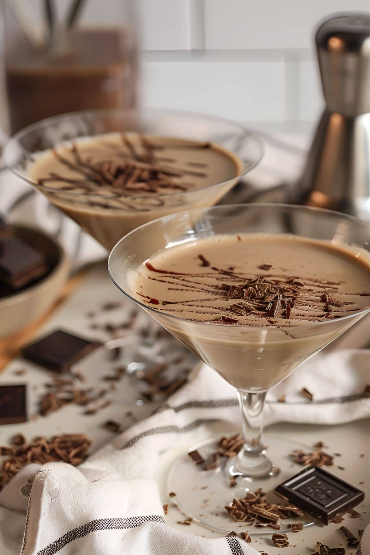 Two Godiva Chocolate Martinis with Chocolate Drizzle, Chocolate Shavings, and Chocolate Around the Table