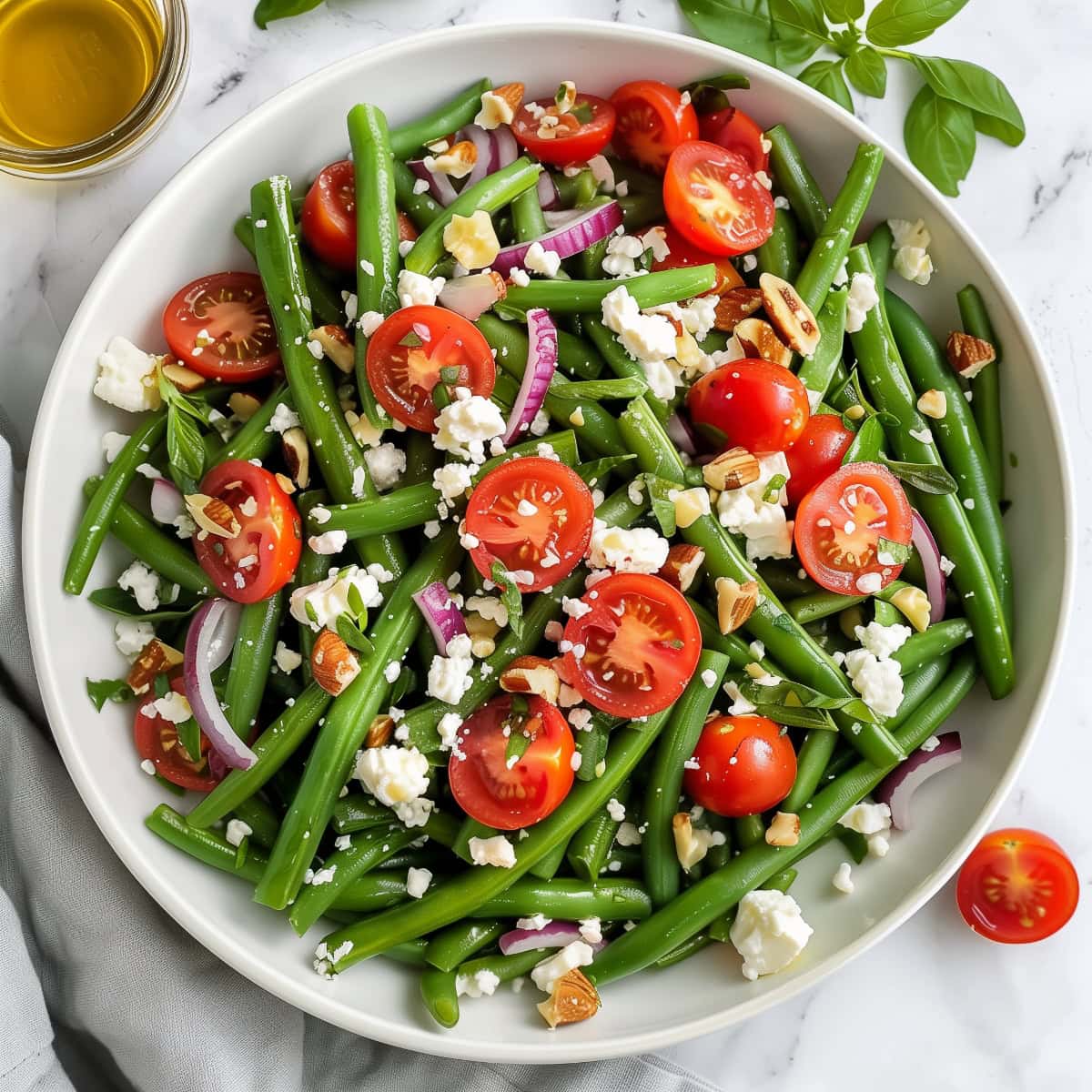 Fresh green bean salad with cherry tomatoes, red onions, and a tangy vinaigrette.
