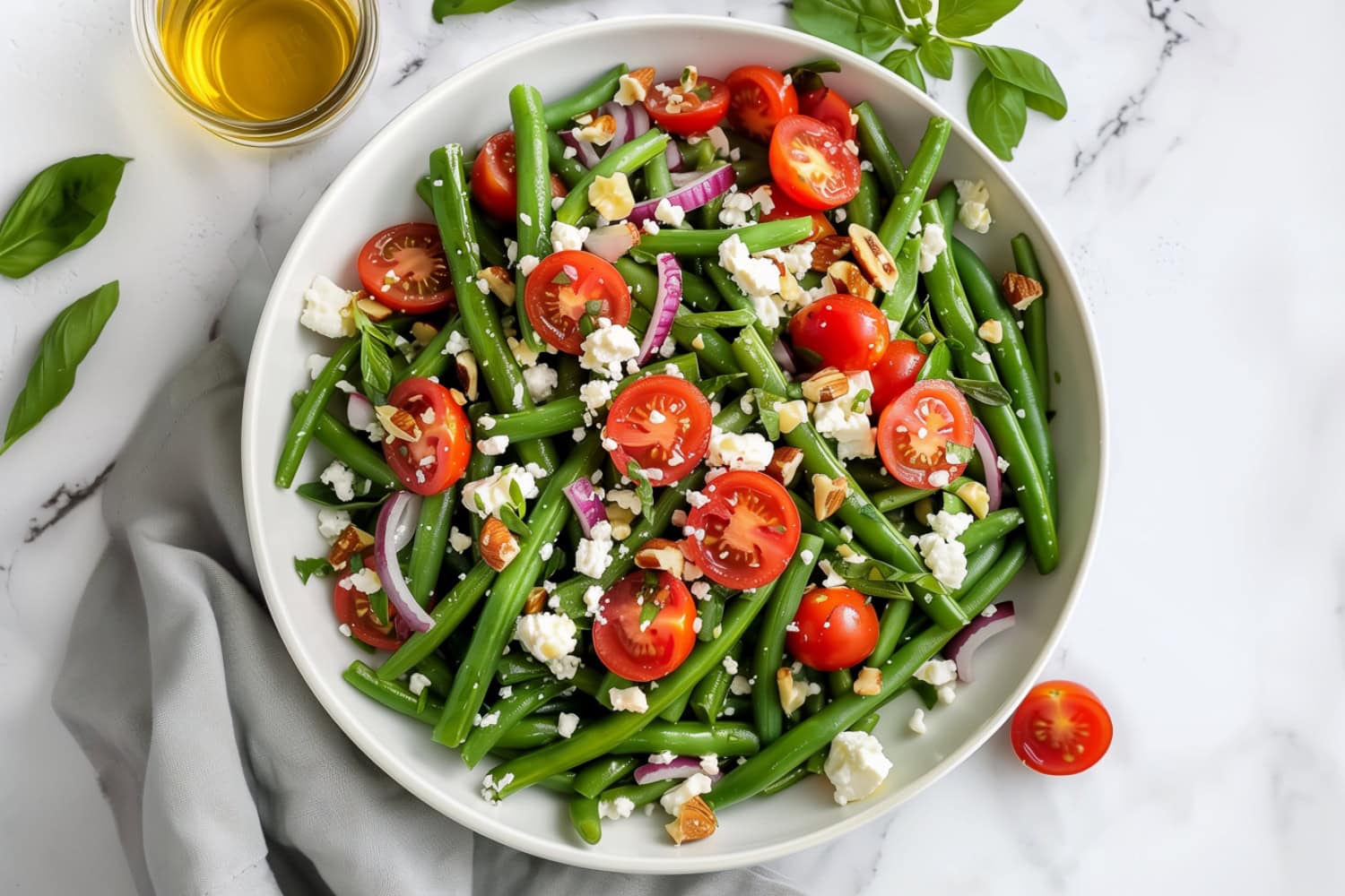 Easy and delicious homemade green bean salad with cherry tomatoes and crumbled feta.