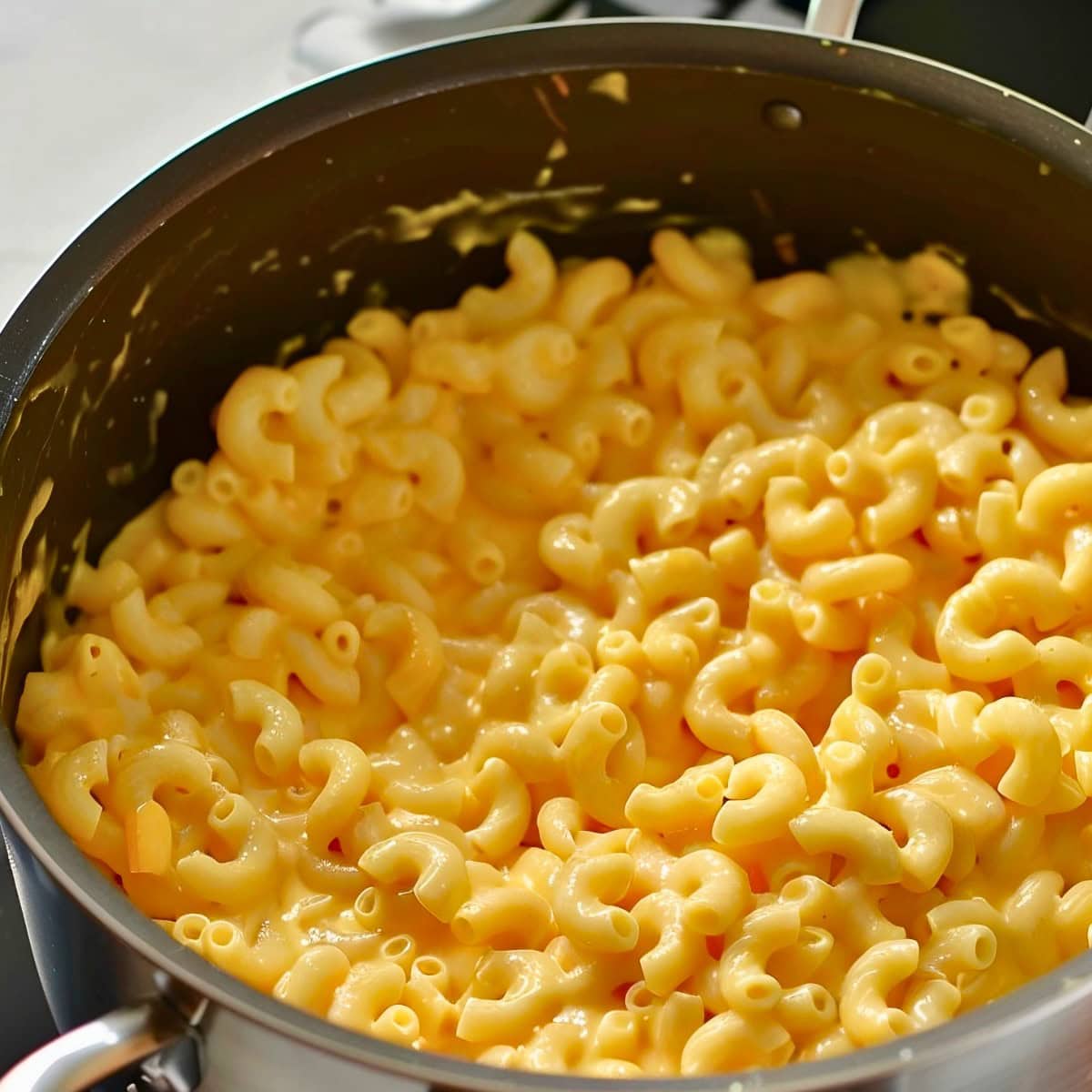 Top Side View of Macaroni and Cheese Cooking in a Pot