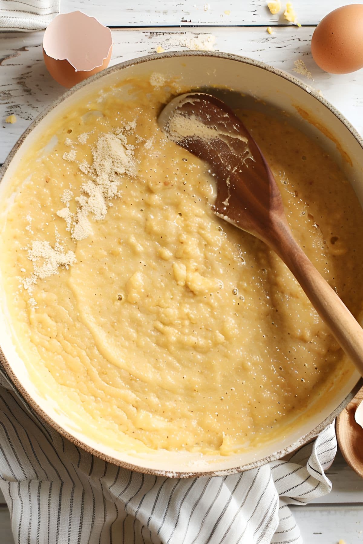 Top View of Marie Callender's Cornbread Batter in a Bowl with a Wooden Spoon