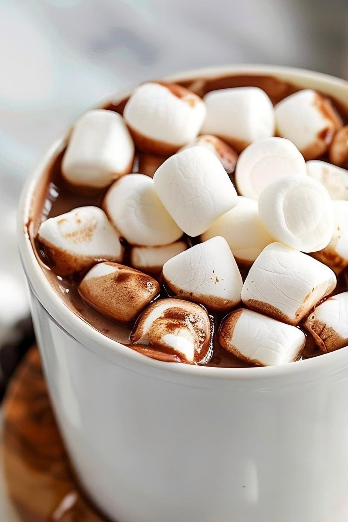 Close Up of Crockpot Hot Chocolate in a Mug, Piled High with Marshmallows