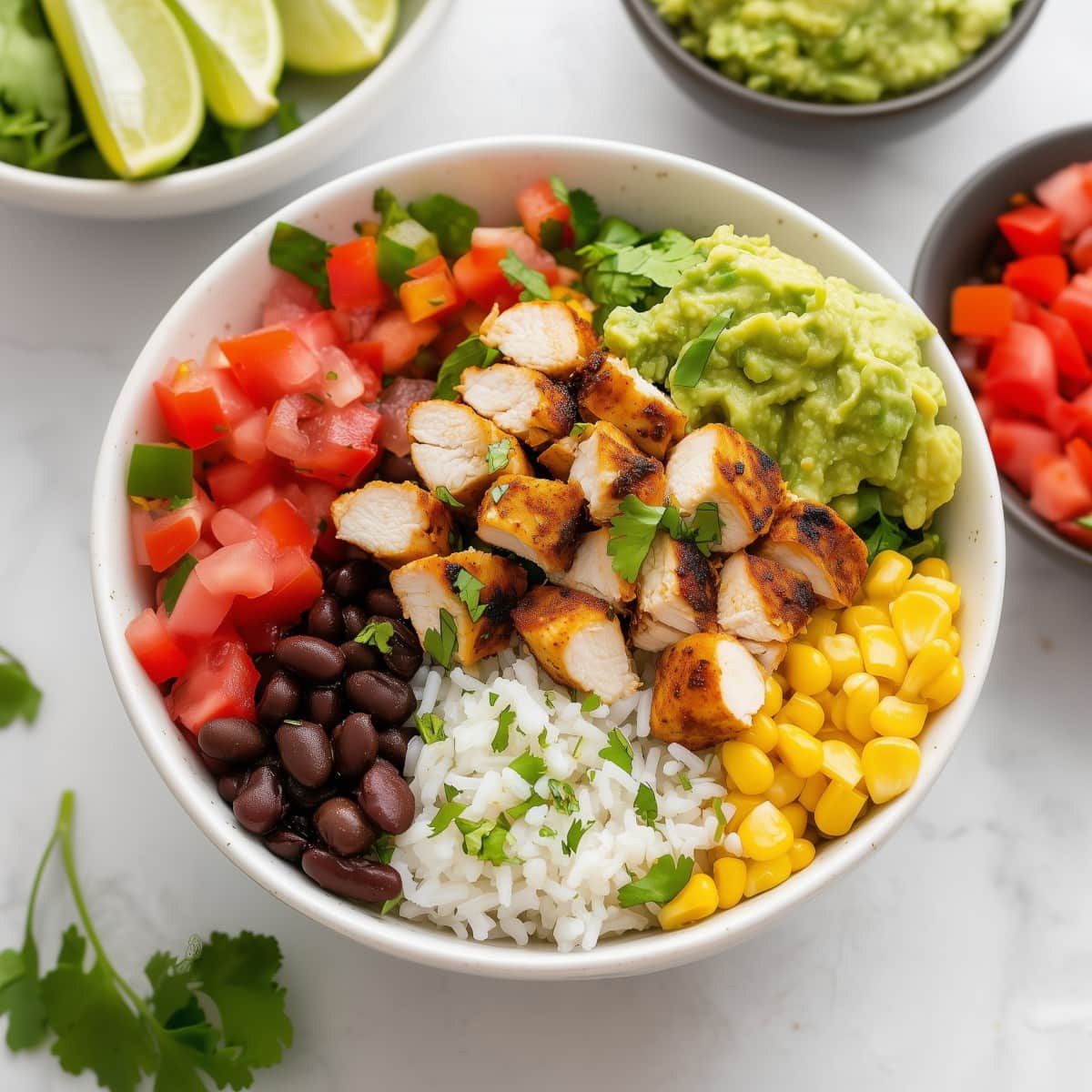 Hearty chipotle burrito bowl with rice, beans, and grilled chicken.