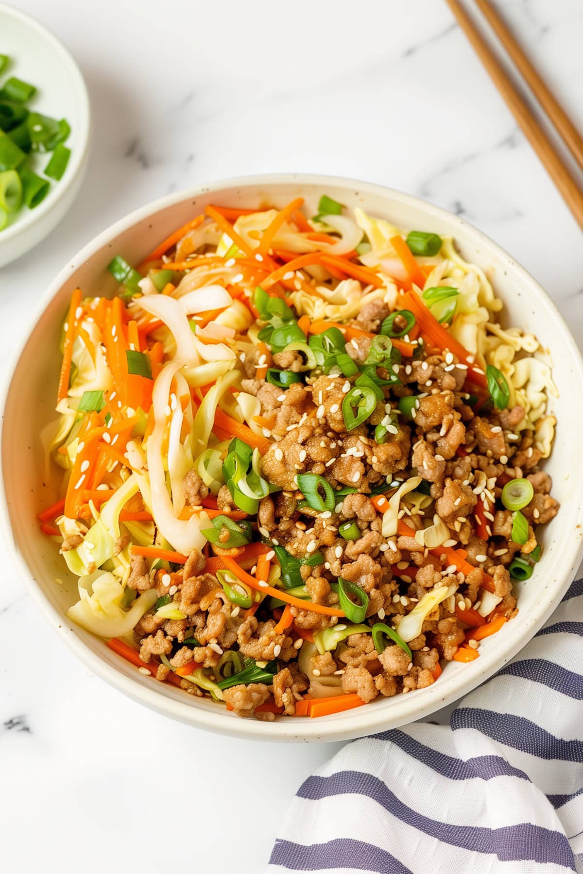 Egg Roll in a Bowl with Ground Beef, Cabbage, Carrots and Chopped Onions