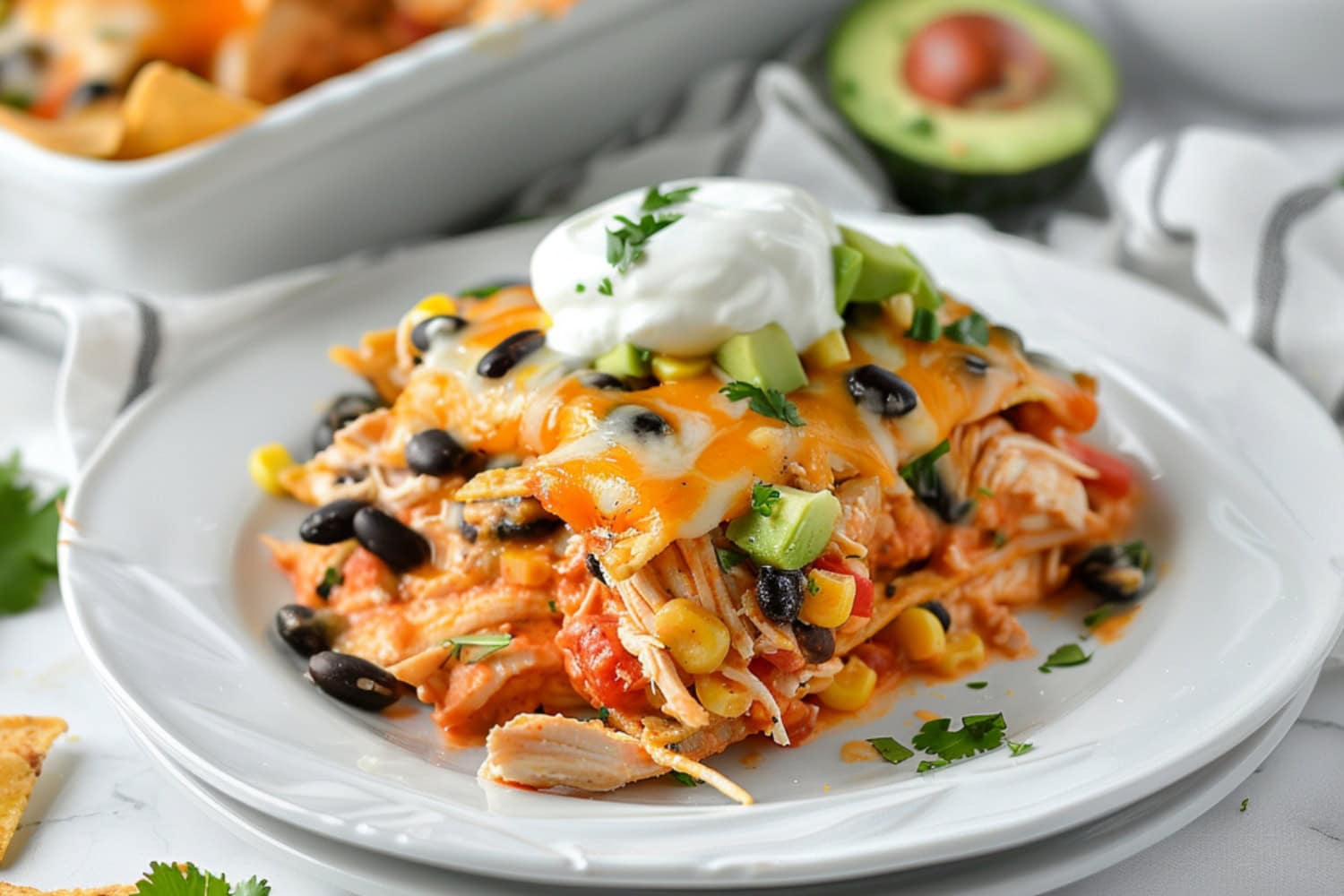 Portion of a Mexican chicken casserole served on a plate.