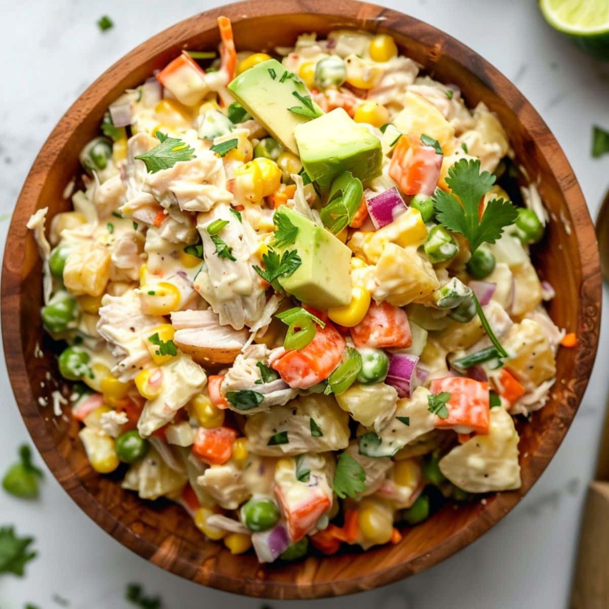 Mexican Chicken Salad in a wooden serving bowl.