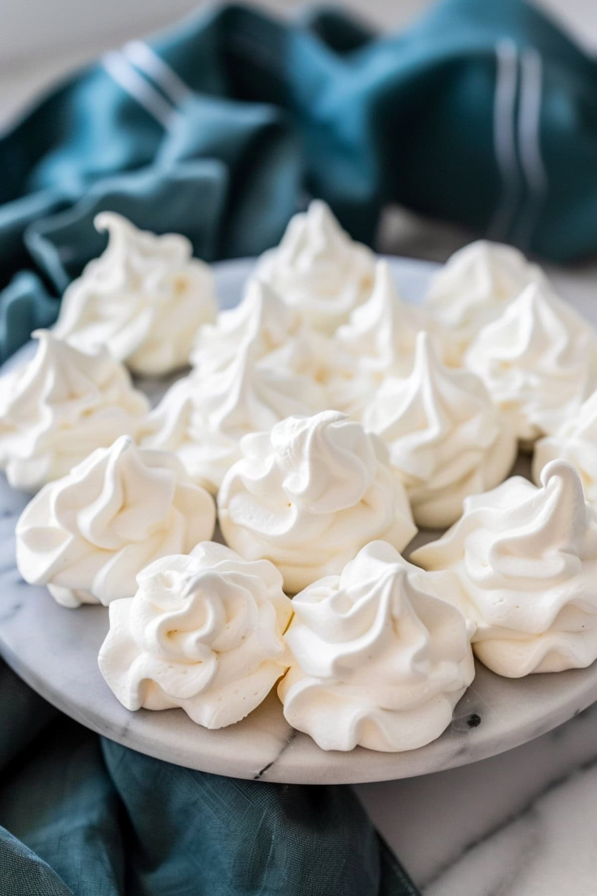 Vanilla Meringue Cookies on a Kitchen Stand.