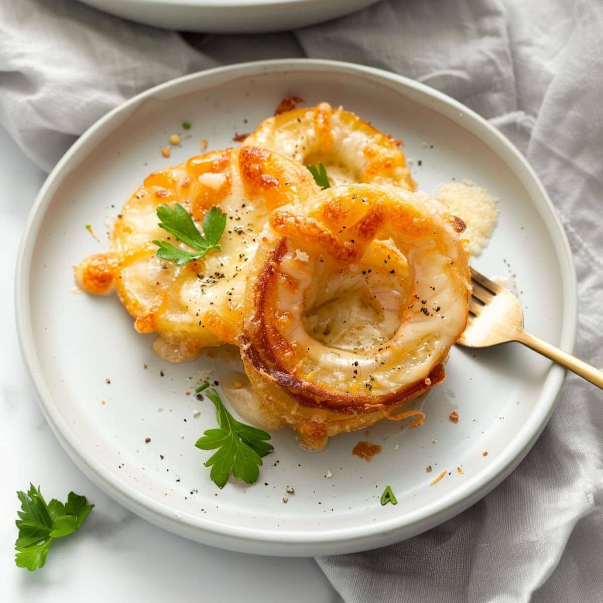 Serving of Tennessee onions on a white plate.