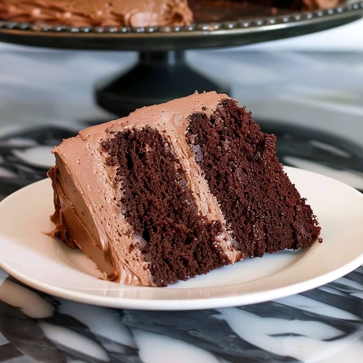 A Slice of Chocolate Mayonnaise Cake on a Plate