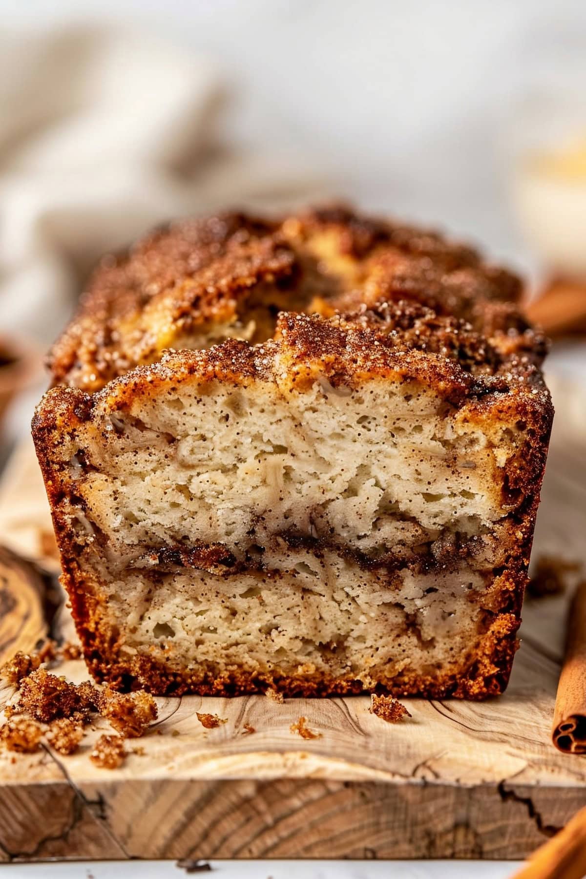 Cinnamon Crunch Banana Bread in a Wooden Board