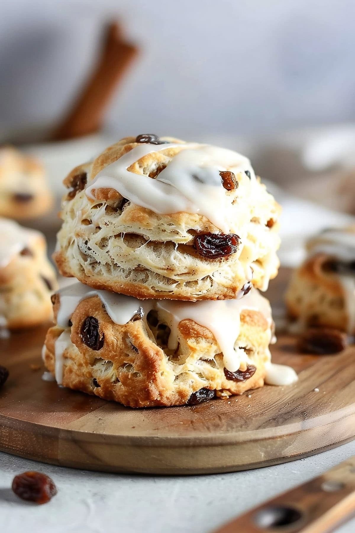 Cinnamon Raisin Biscuits Stacked with Vanilla Glaze.