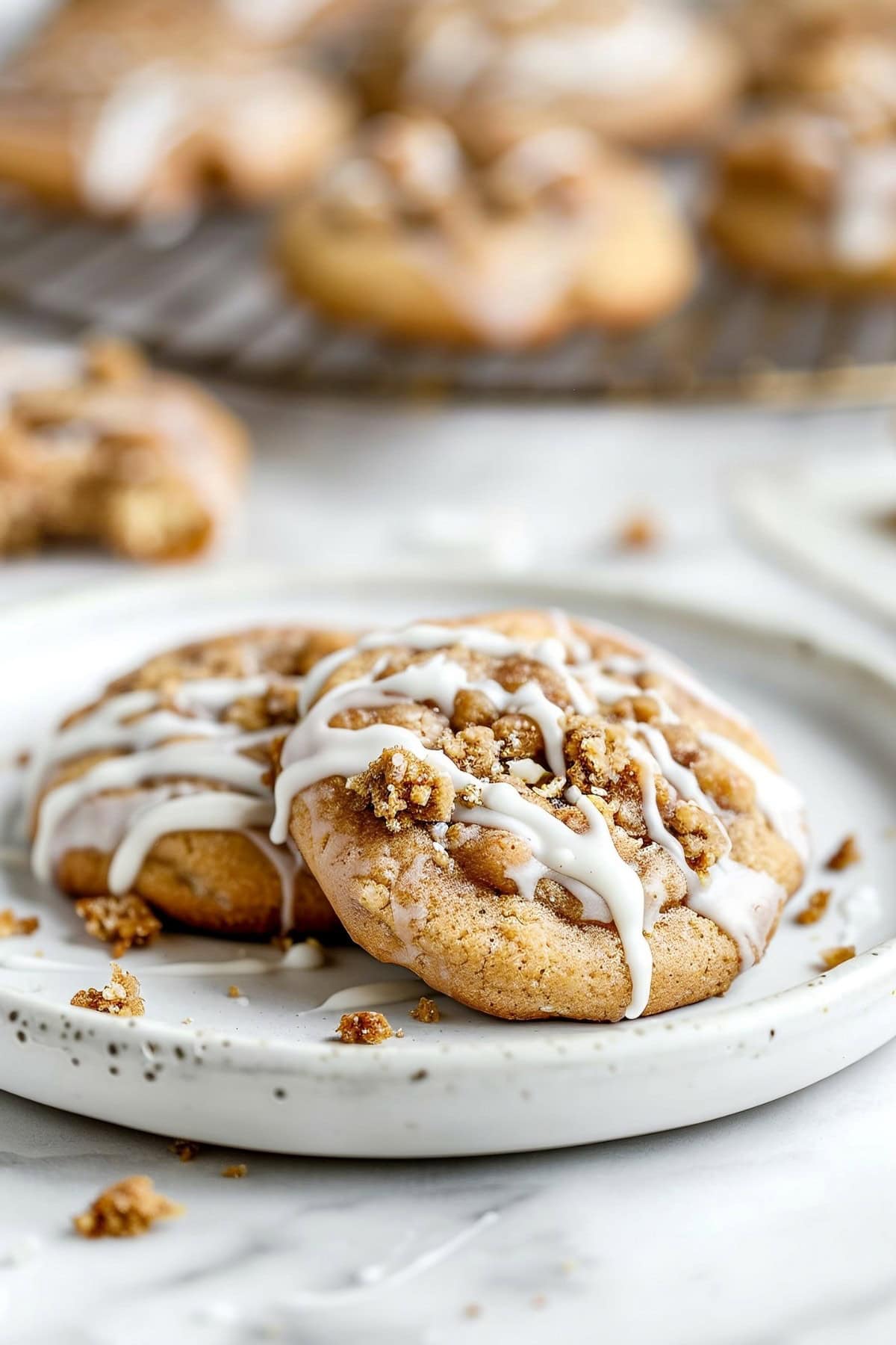 Decadent coffee cake cookies, fresh out of the oven with a golden-brown streusel topping.