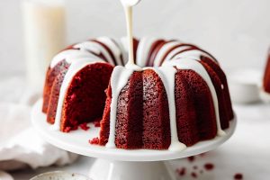 Red Velvet Bundt Cake with Glaze in a Kitchen Stand