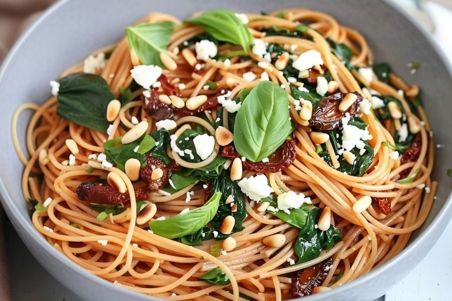 Spaghetti with Sun Dried Tomatoes and Spinach