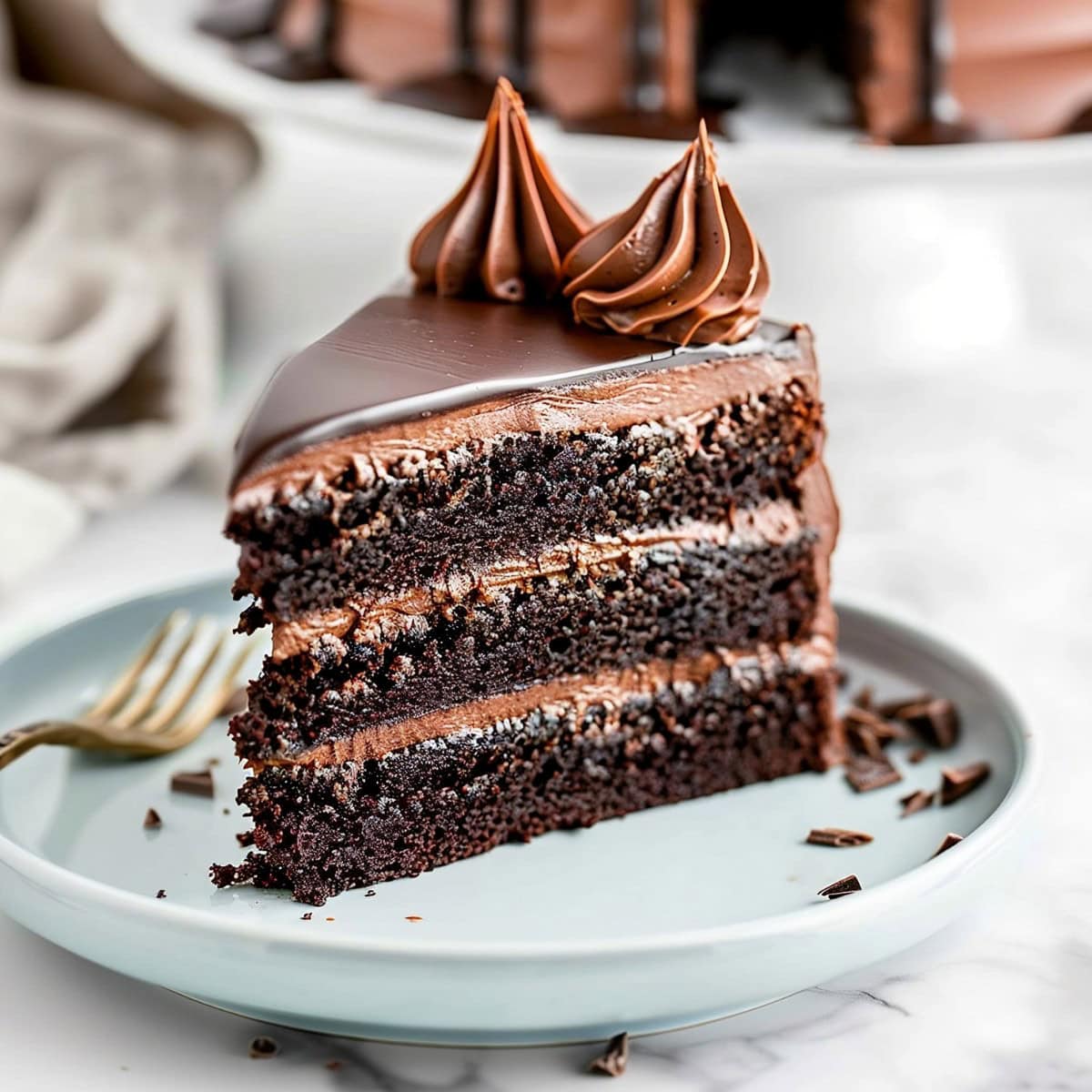 Moist and Decadent Homemade Triple Chocolate Cake Slice