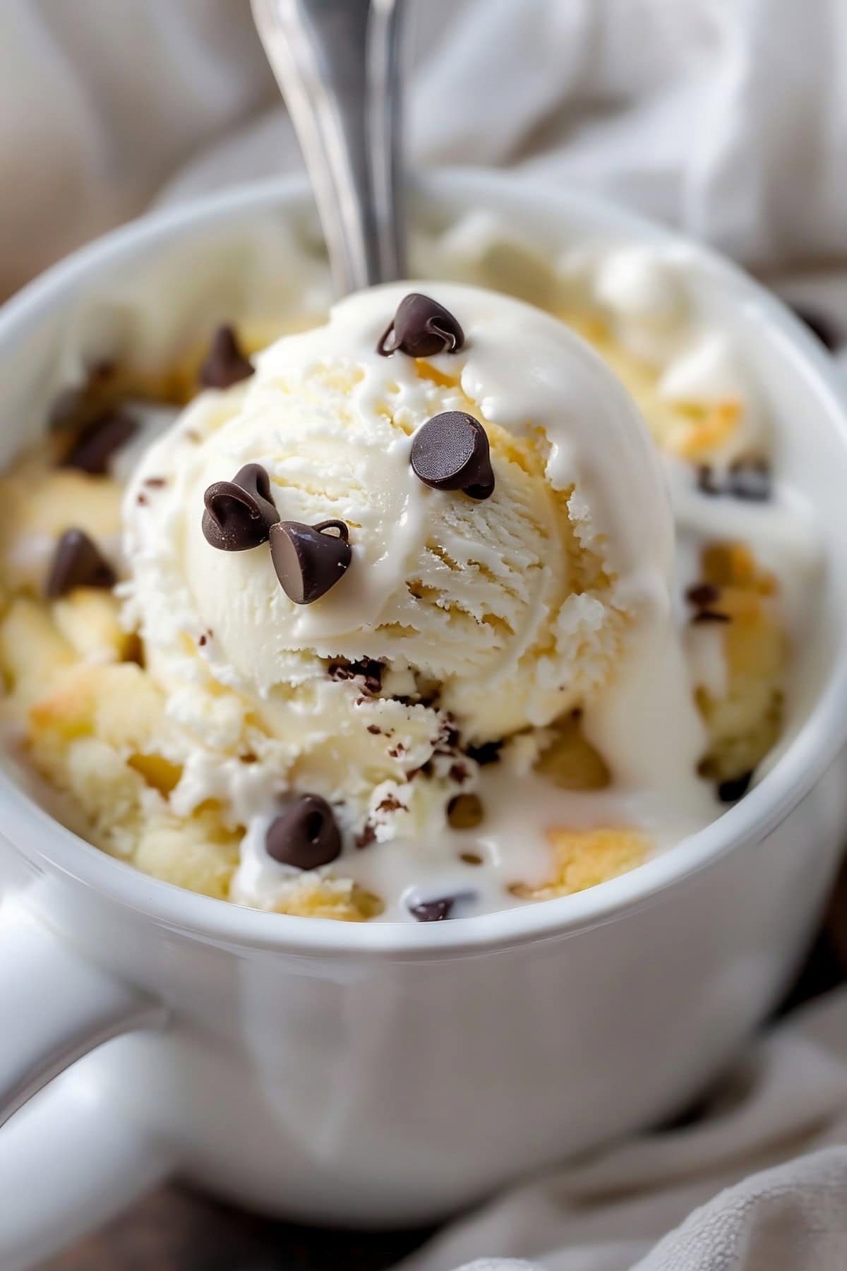 Homemade Vanilla Mug Cake with Chocolate Chips.